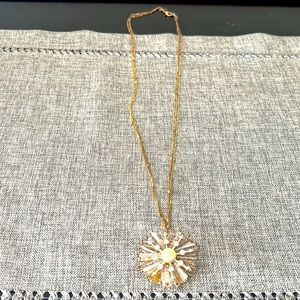 Long, gold flower necklace